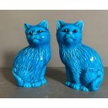 A pair of Mid Century turquoise blue ceramic cats