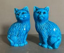 A pair of Mid Century turquoise blue ceramic cats