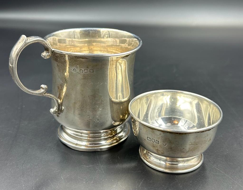 An engraved silver tankard and small hallmarked silver pot (Approximate Total Weight 107g)