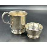 An engraved silver tankard and small hallmarked silver pot (Approximate Total Weight 107g)