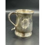 A silver tankard by Wakely & Wheeler, hallmarked for London 1915 9cm H and approximately 155g.