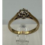 A 9ct and diamond (.25 ct) ring, approximate size P1/2