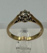 A 9ct and diamond (.25 ct) ring, approximate size P1/2