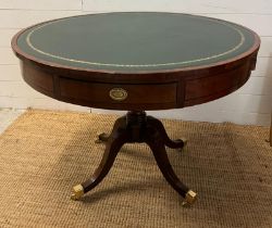 A Regency mahogany inlaid drum table with four drawers and green leather top (H75cm Dia100cm)