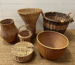 Six wicker baskets of various sizes