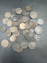 A quantity of old coins circulated, worn, including Georgian and Cartwheel copper