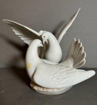 A large boxed Lladro figure of necking doves Condition Report good condition