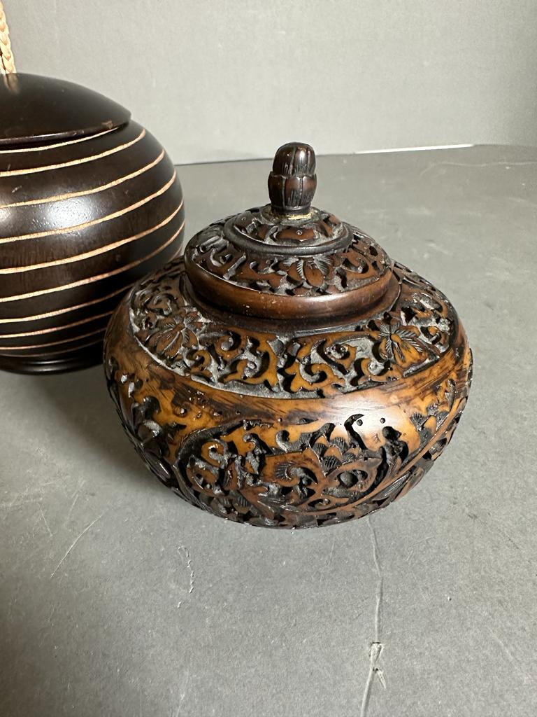 A selection of four wooden carved lidded pots - Image 2 of 4