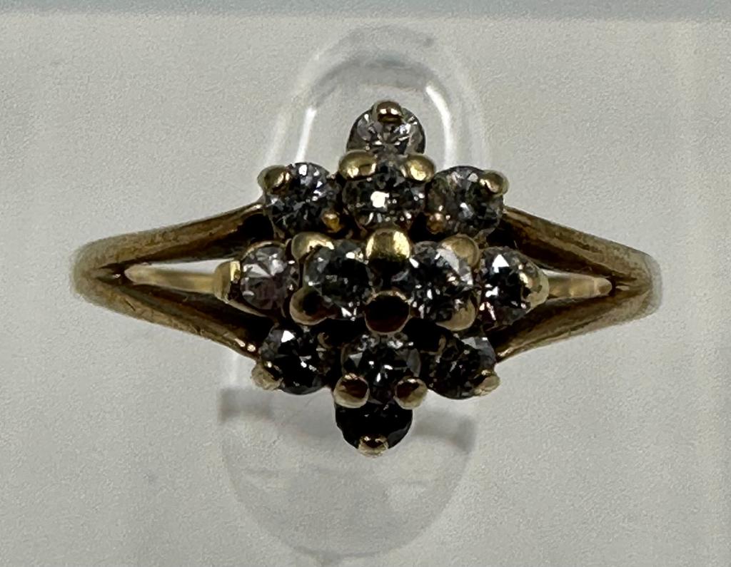 A 9ct gold and diamond ring, approximate size M