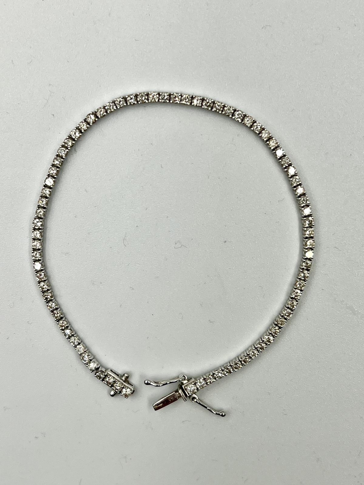 An 18ct white gold Tennis or line bracelet set with approximately 3ct of diamonds. - Image 24 of 25