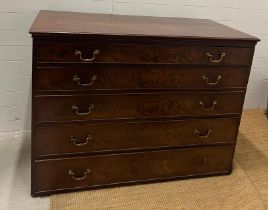 A large mahogany chest of drawers with five long graduating drawers and brass handles (H104cm W140cm