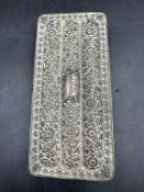 An Indian silver cigar case with floral engraving