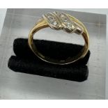 An 18ct, marked 750 diamond ring, approximate weight 4.5g, size O.