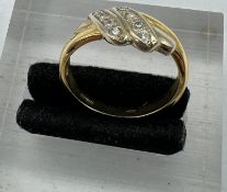 An 18ct, marked 750 diamond ring, approximate weight 4.5g, size O.