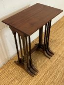 Nest of three Edwardian style mahogany nesting tables on ring turned legs (H61cm W48cm D30cm)