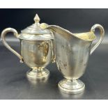 A Sterling silver milk jug and lidded sugar bowl (Combined Total Weight 274g)