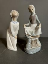 Two boxed Lladro figures, a young lady with a rabbit and a girl in her night clothes Condition