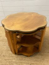 Art Deco walnut nest of tables, the centre table sits over shaped pull out side side tables all with