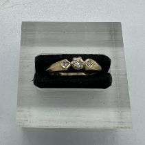 A 9ct gold and diamond ring approximate size M