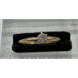 A 14ct gold diamond ring, size L