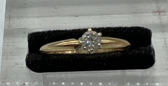 A 14ct gold diamond ring, size L