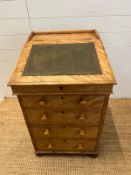 A Satin Birch davenport with leather top and four drawers to front (H80cm W57cm D52cm)