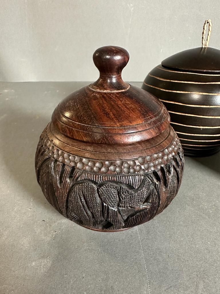 A selection of four wooden carved lidded pots - Image 4 of 4