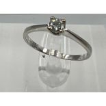 An 18ct white gold diamond ring, approximate size N