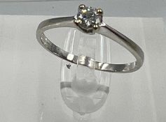An 18ct white gold diamond ring, approximate size N
