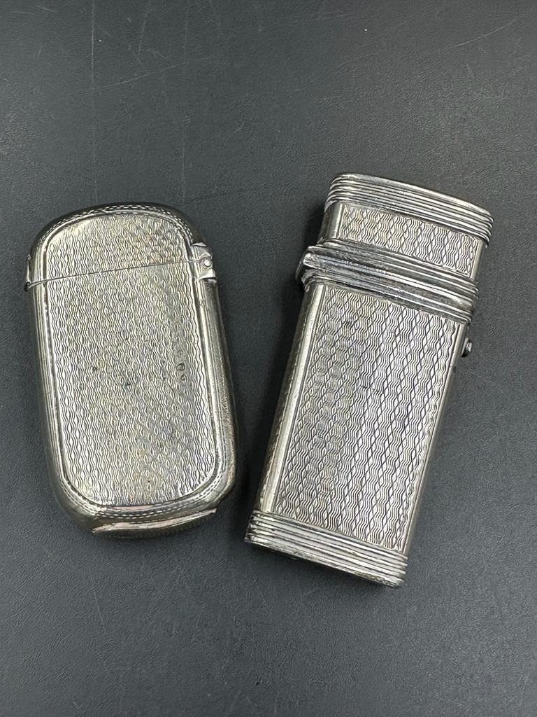 Two silver vesta cases, various hallmarks and makers.