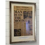 A framed front cover of The Daily Express dated July 21st 1969 "Man is on the Moon" (52cm x 77cm)