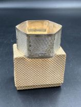 A single silver boxed napkin ring by hallmarked for Sheffield 1965 by Viner's Ltd