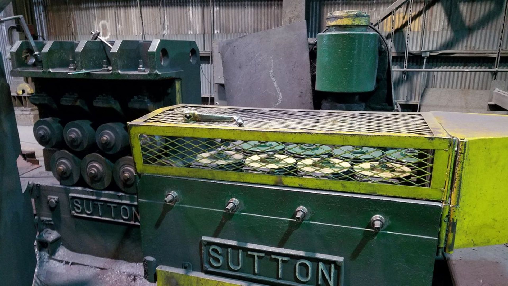 Sutton 2-Plane Straightener with Motorized Infeed and Outfeed Conveyors and Stack Stands, (Mill