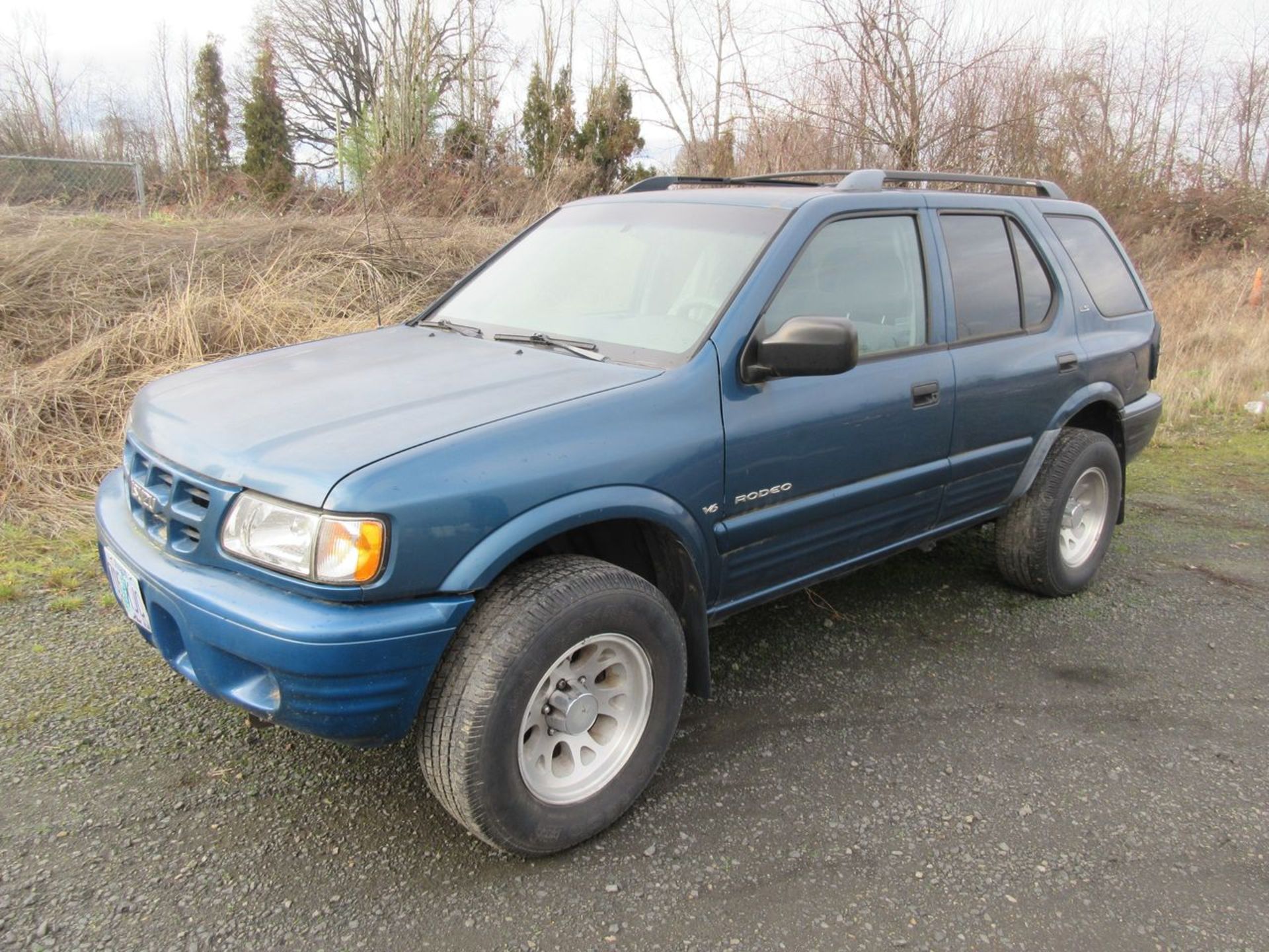 Isuzu Rodeo LS 4-Door Sports Utility Vehicle, VIN: 4S2CK58W914361609 (2001); with V6 Gas Engine,