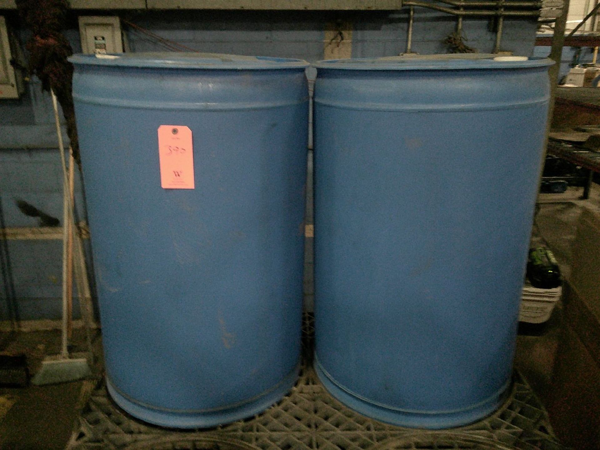 Lot - (2) Assorted Plastic Drums