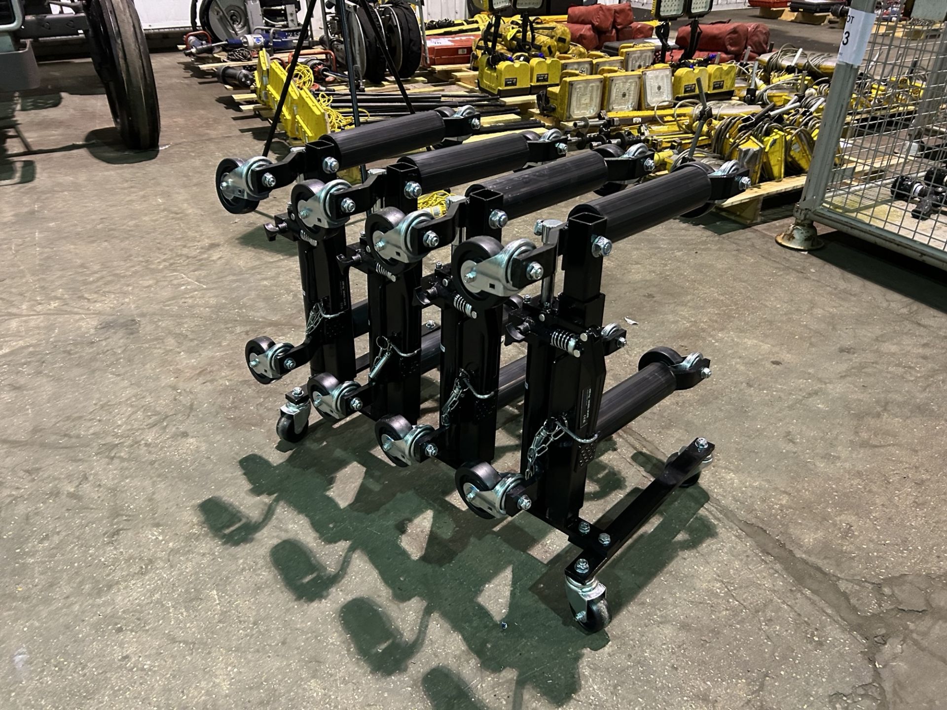 New and unissued set of 4 Heavy Duty Hydraulic Wheels Skates on storage stand - Image 2 of 14