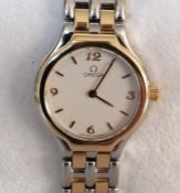 A ladies Omega De Ville quartz wristwatch with white dial, Arabic and baton markers