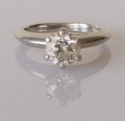 A Tiffany & Co. solitaire diamond ring in a six-claw platinum setting