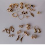 Nine pairs of gold earrings, all hallmarked 9ct, 12.8g; seven pairs, unmarked, as found, 22g