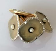 A pair of white and yellow gold cuff links with seed pearl decoration