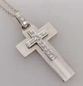 A white gold crucifix pendant with chain comprising twelve pave-set diamonds