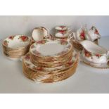 A fifty-piece Royal Albert Old Country Roses tea service comprising eight cups/saucers/plates