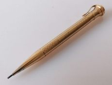 A George V 9ct gold pencil with engine turned design by Wahl Eversharp & Co., London, 1937
