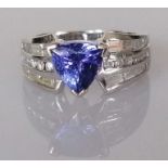 A tanzanite and diamond ring