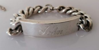 A heavy curb-link silver identity bracelet, 20 cm, inscribed, hallmarked, 115g