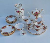 A Royal Albert Old Country Roses tea service comprising six cups/saucers/plates