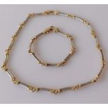 A 9ct white and yellow gold rope-twist design necklace, 40 cm, and matching bracelet, 17 cm