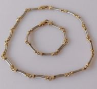 A 9ct white and yellow gold rope-twist design necklace, 40 cm, and matching bracelet, 17 cm