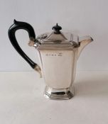 A George V Elkington & Co. silver coffee pot with harp-shape wooden handle