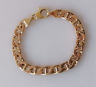 An Italian 9ct gold flat curb-link bracelet by Unoaerre, with lobster clasp, 18 cm, hallmarked